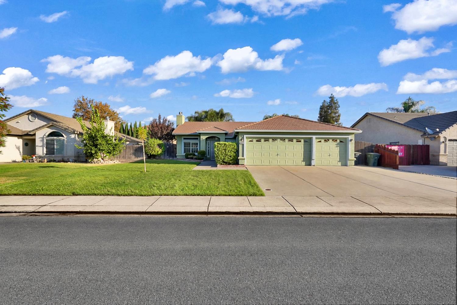 Front exterior of 7413 Morgan Lynn Lane in Hughson, California